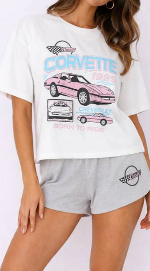 Corvette graphic tee and gray shorts.