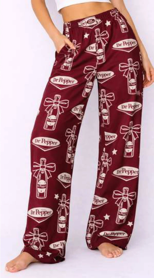 Burgundy Dr Pepper lounge pants with cans and bows.